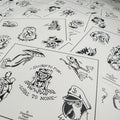 a selection of sheets of Buddy Holiday flash spread out featuring skulls, a jumping frog, crosses, storm clouds, cherry hearts, a parrot, and much more. All painted in traditional style and black ink.