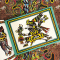 Inside pages of Chimu Grigio Art featuring a colorful warrior in pre-historic style.