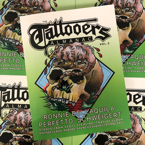 Front cover of The Tattooers Almanac Vol. 2 featuring a rat and a skull on a green cover.