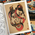 Inside pages of Daniele Tonelli - Japanese Flash & Lines featuring a black and red snake surrounding and weaving through a hannya mask on a light tan background with a white border.
