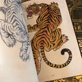 Alix Ge sketches wild cats such as tigers.