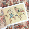 Inside pages of Kyosai featuring colorful depictions of animals and humanoid demons.