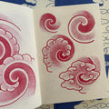 Traditional Japanese red sketches of vortices and clouds from 'Looking For the Right Flow Volume 2' a tattoo book by Fabio Gargiulo.