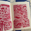 Traditional Japanese red sketches and back piece studies of vortices, clouds and wind from 'Looking For the Right Flow Volume 2' a tattoo book by Fabio Gargiulo.