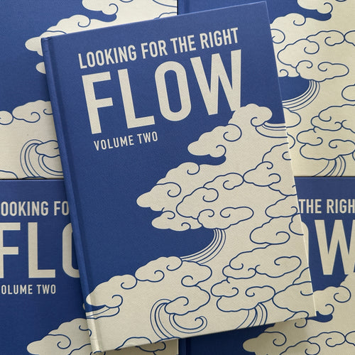 'Looking For The Right Flow Volume 2'  is a tattoo book about Japanese background studies by Fabio Gargiulo, with a blue hardcover, white text, and cloud imagery.