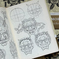 Inside pages of Steve Morante's Sketches featuring line drawings and sketches of Japanese designs showcasing oni.