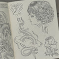 Inside pages of Sterling Barck's, 'Permanence', featuring line drawings of a lady head in a turban, a snake and mask with a dagger, a rose, and a heart.