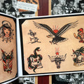 Inside pages of Tahiti Felix's Painless Nell Collection featuring a range of color flash including an eagle, a Texas longhorn, a skull and a snake, among others.