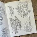 Inside pages of Line Drawings by Chris Stuart featuring various line drawings done in the traditional style, including a dog head adorned by a rose, a girl head with butterfly wings, and a version of the Rock of Ages.