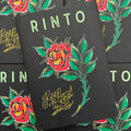 Front cover of Keep It Real by Rinto featuring a color drawing of a rose on a black background.