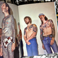 Inside pages of "You Had to Be There" by Billy Tinney featuring a vintage photograph of Lyle Tuttle and other men  showcasing their tattoos.