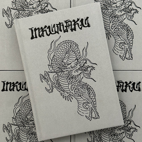 Front cover of Inkumaku by Salvio featuring a line drawing of a dragon on a grey background.