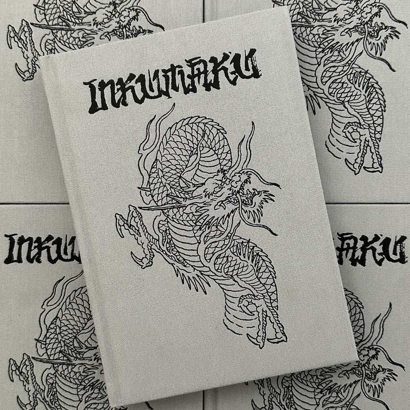 Front cover of Inkumaku by Salvio featuring a line drawing of a dragon on a grey background.