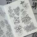  Inside pages of Japanese Tattoo Outlines by Leo Barada featuring line drawings of flowers such as chrysanthemums, lotuses, and peonies.