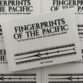Front cover of book 'Fingerprints of the Pacific' by Will Cattersel featuring a tribal pattern, black on a grey background.