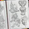 Inside pages of Dan Moreno's 'Magic Moreno Sketchbook Volume 1' featuring an open book with a skull and candle on it, a bleeding cobra, a conch with Christ in it, and a folded foo dog.