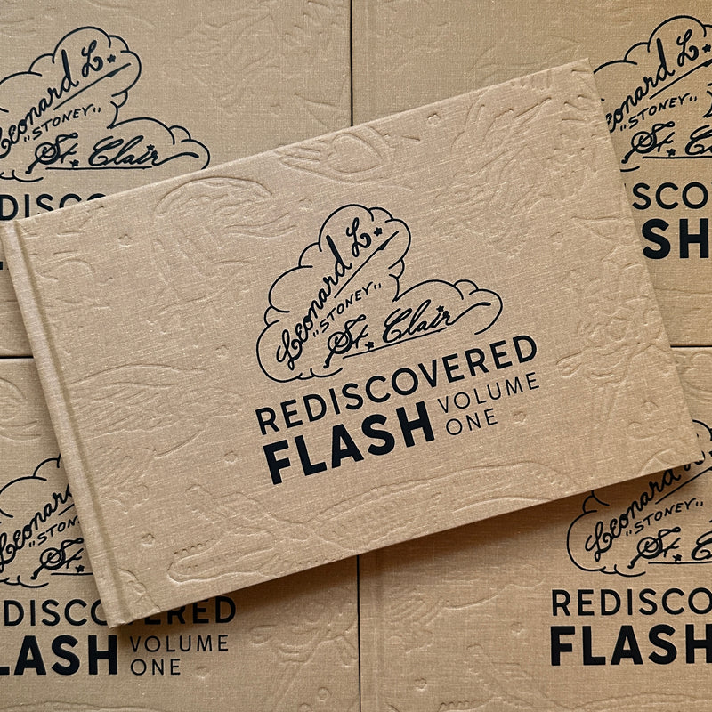 Front cover of Stoney St. Clair 'Rediscovered flash Vol. 1', featuring a tan hardcover with flash prints of a snake, a skull and dagger, a crocodile, a wolf head and a parrot.