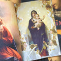 Inside pages of 'Virgin Mary', featuring the Virgin Mary on a throne in heaven holding the baby Jesus, while the angels surround her and hold up gold gifts.
