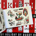 Inside pages of Buddy Holiday Tiki Tattoo Designs Vol. 3 featuring flash paintings of a skull drink with an umbrella in it, a bird surfing next to a volcano, a monkey hanging upside down holding a drink, a tiki mask on the right, a drink with a skull in it and playing cards, and the words 'surfin bird', all painted in red, green, and gold.