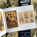 Inside pages of tattoo book "Lotteva Wagner Davis : Hand Tattooist & Artist of the American West" featuring flash art of ships by Lotteva and Gus Wagner.