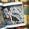 Inside pages of, 'Something wicked from Japan', featuring a giant skeleton overlooking a Samurai