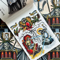 Inside pages of BD 46, featuring a painting by Heather Bailey, of two beings with birds at their feet, holding sun and moon staffs, representing day and night. at the top their is a sacred heart torn open, with flames coming out and an eye above it, and a dragon and snake coming out on either side