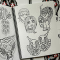 Inside pages of Volume 3 sketchbook by Javier DeLuna featuring line drawings of various Chicano subjects, including smile now cry later clowns, and a clown-faced man holding a riffle.