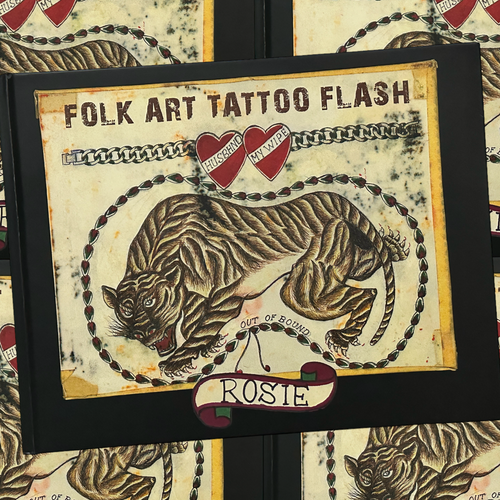 Front cover of Rosie Folk Art Tattoo Flash book featuring a tiger drawing, a design of hearts on a chain, a banner with the name 'Rosie', and bold lettering. A black border surrounds the imagery.
