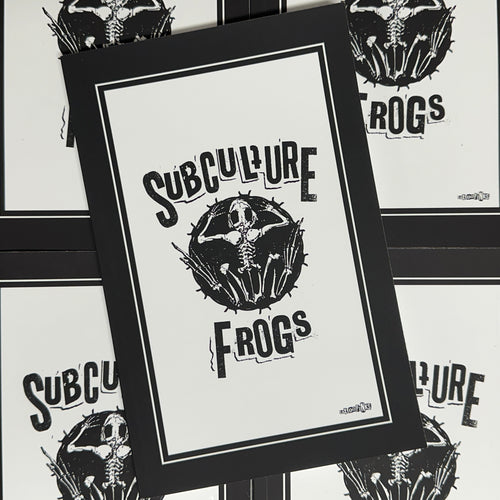 Front cover of Subculture Frogs featuring a black and white illustration of a frog skeleton, plus white block text on a white background.