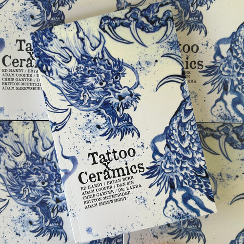 Front cover of Tattoo X Ceramics featuring a painting of a blue dragon.