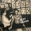 Front cover of The Bert Grimm Tattoo Museum Collection featuring a photograph of Bert Grimm tattooing.