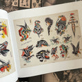 Inside pages of The Bert Grimm Tattoo Museum Collection featuring color flash by Bert Grimm showcasing traditional motifs such as eagles, panthers, snakes, and ladies.