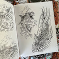 Inside pages of The Tiger Book by Tim Lehi featuring black and grey illustrations of tiger sharks.