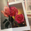 Inside pages of of Vintage Postcards: Ladies & Roses featuring vintage color photographs of roses.