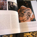 Photograph of a skull tattoo on a back, from Filip Leu book.