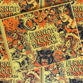 Front cover of Devin Burnett & James Yocum Tattoo Flash featuring a collage of flash including skulls, cats, roses, and other tattoo imagery in black, orange, and yellow.