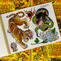Inside pages of Devin Burnett & James Yocum Tattoo Flash featuring a tiger, a black panther and snake, and a chrysanthemum all in color and traditional style.
