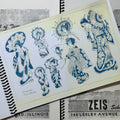 Inside pages of Dana Brunson - Zeis School of Tattooing Vol. 1 featuring Asian ladies in different poses and garments all done in blue ink and vintage traditional style.