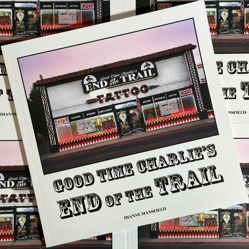 Front cover of Photo Dianne - Good Time Charlie's End of the Trail featuring a photograph of the front and entrance to the End of the Trail Tattoo shop. The rest is a white background and the title of the book on old-timey black font.