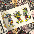 Inside pages of Greg Christian art featuring three Mickey Mouse hybrids; one a devil, one a dragon, and one a hannya. All three are rendered in traditional style and colors.