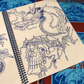 Line drawings of skull and dragon from James Yocum Sketchbook