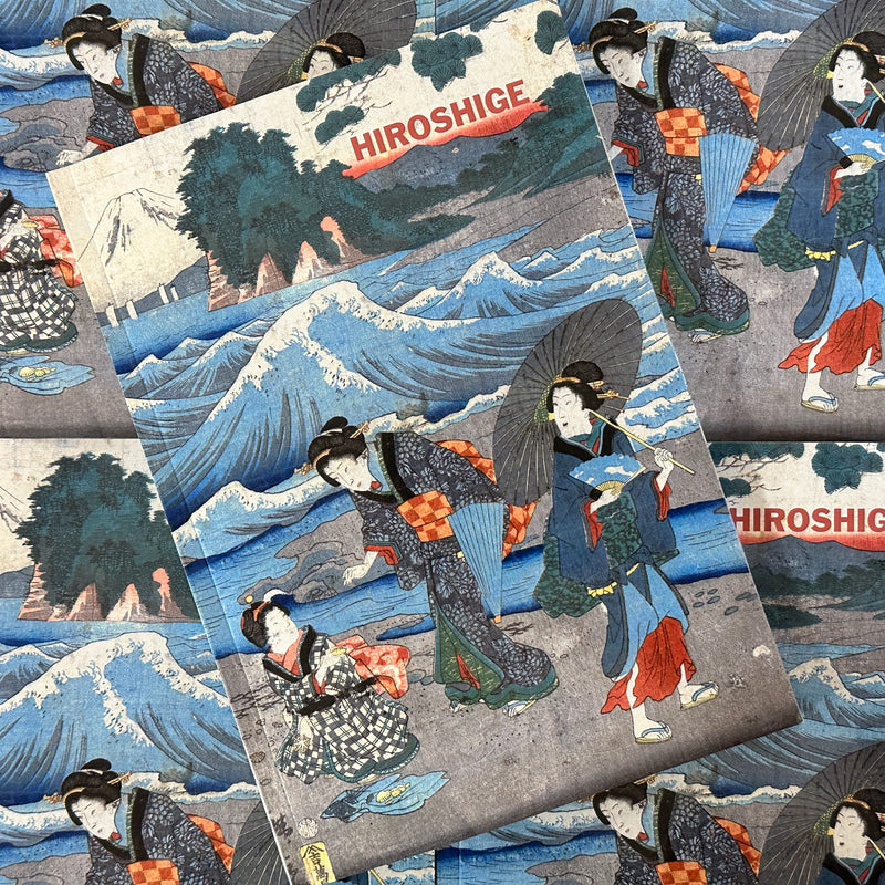 Front cover of Hiroshige featuring a woodcut print of three ladies by the sea.