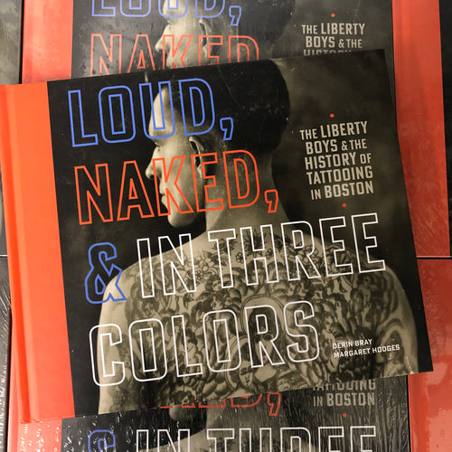 Front cover of The Liberty Boys & The History of Tattooing in Boston - Loud, Naked, & in Three Colors featuring a black and white photograph of a man with a tattooed back and red, white and blue print.