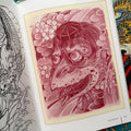 Inside pages of Daan Verbruggen - Ryu: Japanese Drawings & Paintings featuring a red pencil sketch of a mystical creature.