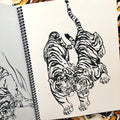 Felines, from Lines & Stripes: Tiger Outlines by Erik Desmond.