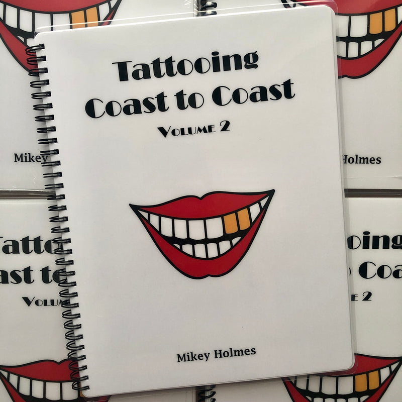 Front cover of Tattooing Coast to Coast Volume 2 by Mikey Holmes. Lips on cover.