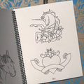 Unicorns and hearts in Sketchbook Vol. 2 by Mike Malone.