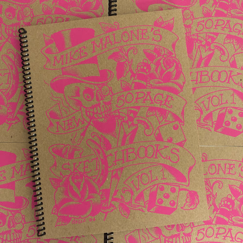 Front cover of Sketchbook Vol. 1 by Mike "Rollo" Malone featuring pink art and lettering on a cardboard cover.