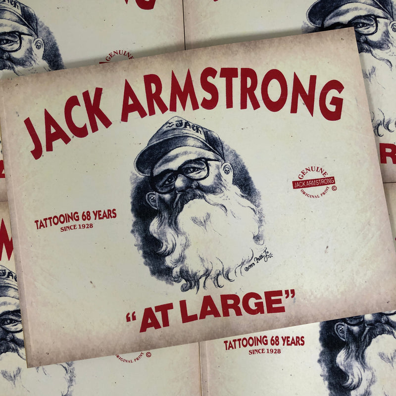 Belzel Books presents Jack Armstrong: At Large. Portrait of the tattooist on beige cover.