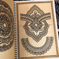 Black ink ornamental designs, from Vol. 1 by Jack Peppiette.